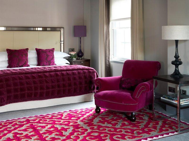 The Bloomsbury Hotel Londra Esterno foto A bedroom at the hotel